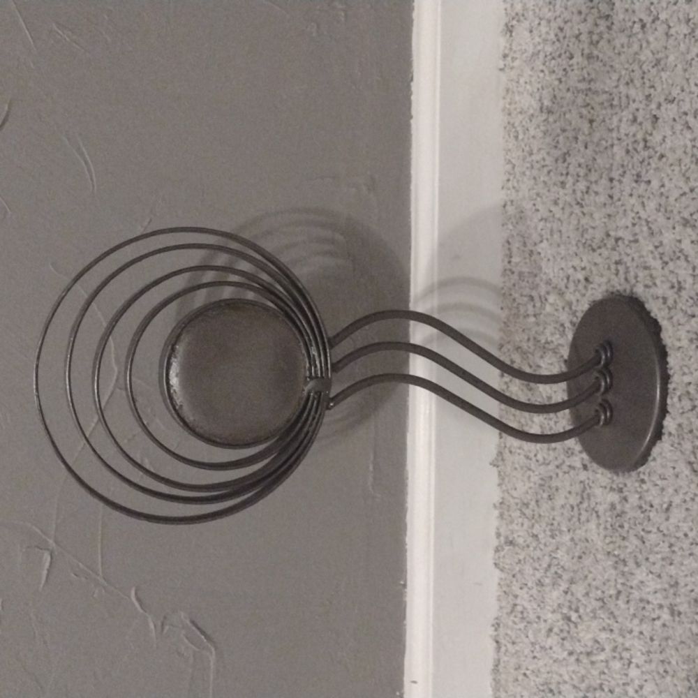 Vintage candle holder. Very unusual and not light weight